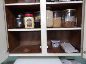 Declutter your kitchen cabinet to store grocery staples